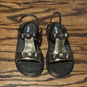 Mini Melissa Barbie Black and Gold Sandals with Sparkly Base